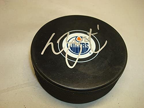 Laurent Brossois potpisao je hokejski pak Edmonton Oilers s 1A-NHL Pakom s autogramom